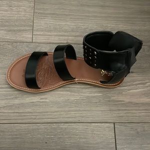 Giselle black Sandals from buckle.